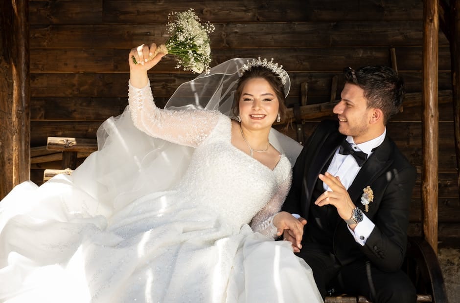 Bride and groom smiling on their wedding day