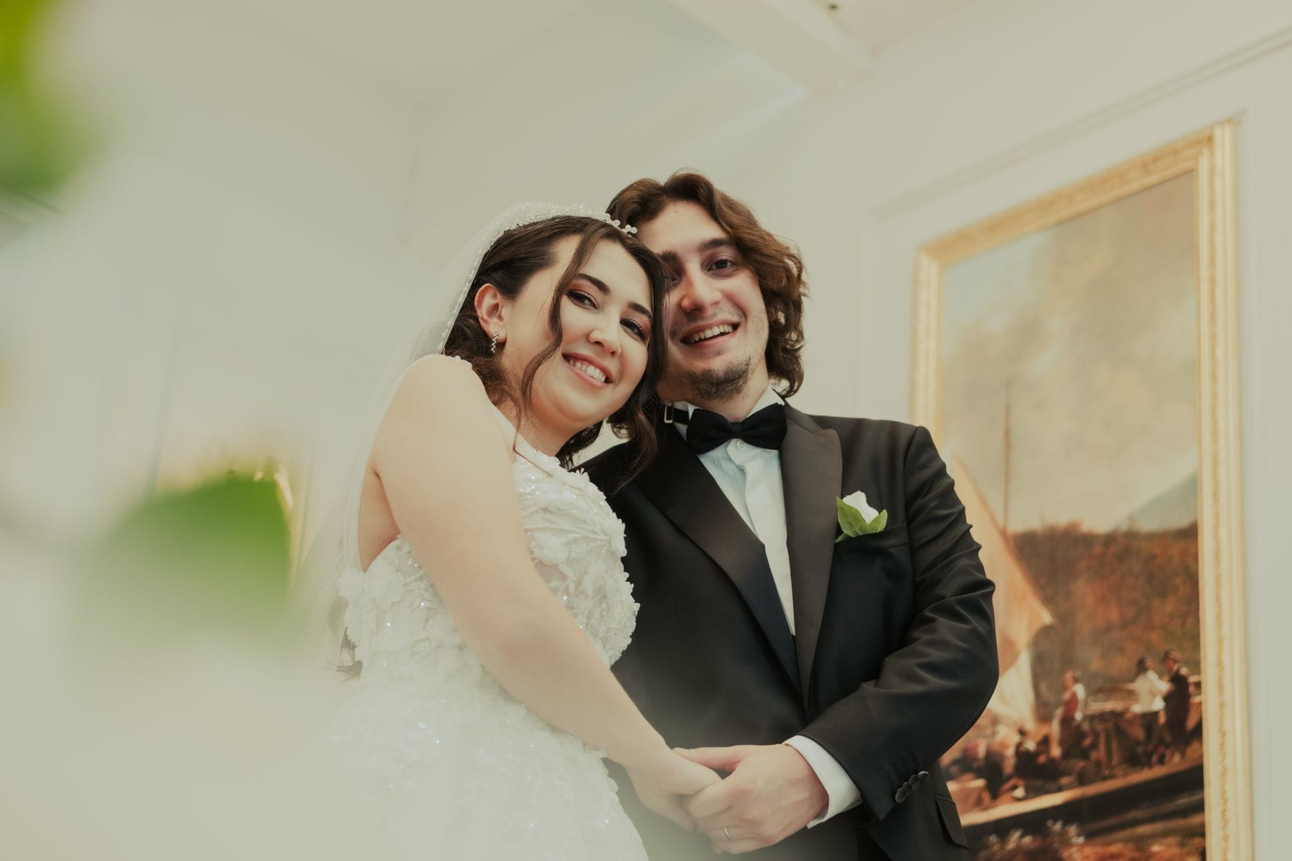 Joyful wedding couple smiling before a big event